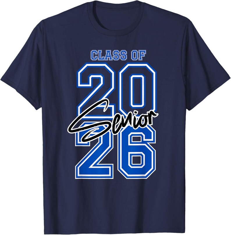 May include: Navy blue t-shirt with the text "CLASS OF 2026 Senior" in white and blue. The numbers "20" and "26" are in a bold, outlined font. The word "Senior" is in a cursive font.