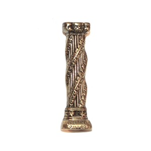 May include: A gold-colored metal pillar with a twisted design and the inscription "PRENTICE 91140" at the base.