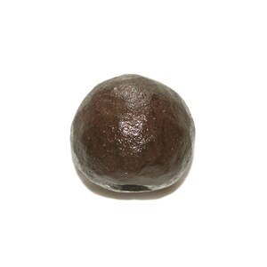 May include: A dark brown, round, ceramic bead with a smooth, slightly textured surface.