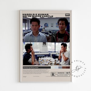 May include: A framed movie poster for "Harold & Kumar Go to White Castle" (2004). The poster features images of the two main actors and the film's title. The poster is beige with black text and a restricted rating.