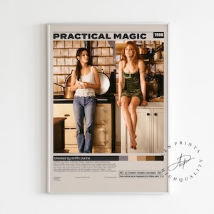 May include: A framed movie poster for "Practical Magic" (1998) featuring two women in a kitchen setting. The poster has a neutral color palette with text at the top and bottom, and a color palette swatch.