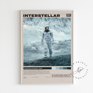 May include: A framed poster for the movie "Interstellar" featuring an astronaut in a spacesuit standing on a rocky, snow-covered landscape. The poster includes the film's title, year, and director's name.