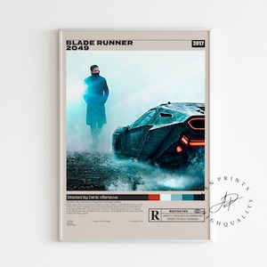 May include: A framed poster for the film "Blade Runner 2049" featuring a figure in a long coat and a futuristic vehicle. The poster has a beige background with the film title and the year 2017 at the top.