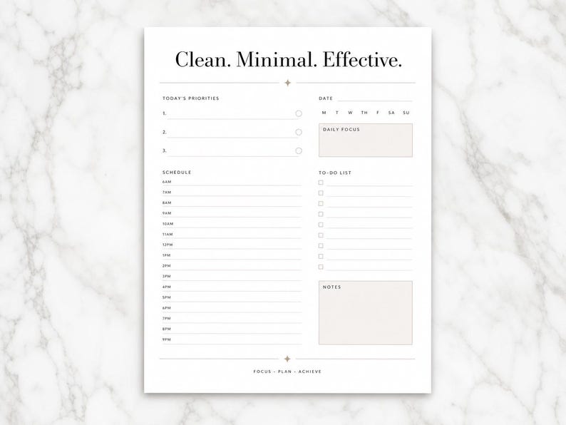 May include: A white daily planner page with black text featuring the header Clean. Minimal. Effective. It includes sections for Today's Priorities, Date, Daily Focus, a schedule from 6AM to 9PM, a To-Do List, and a Notes box with the footer Focus - Plan - Achieve.