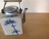 Vintage Chinese porcelain tea pot with brass handle