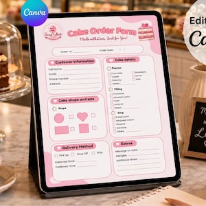 Puede incluir: Un formulario rosa de pedido de pastel en una tableta, con secciones para información del cliente, detalles del pastel y opciones de entrega. El formulario incluye el texto "Cake Order Form" y "Made with Love, Just for You!"