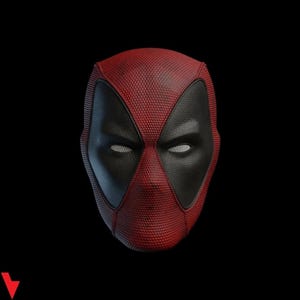 May include: A full-head mask featuring a textured red and black design. The mask has large, almond-shaped black eye patches with white mesh lenses. The surface displays a fine, grid-like pattern across the red sections and a leather-like texture.