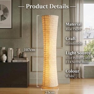 May include: A white, handmade rice paper floor lamp, 107cm (42 inches) tall and 25cm (9.8 inches) wide. It features an LED power cord and an E14 screw bulb. The lamp's neutral colour makes it suitable for various interior styles.