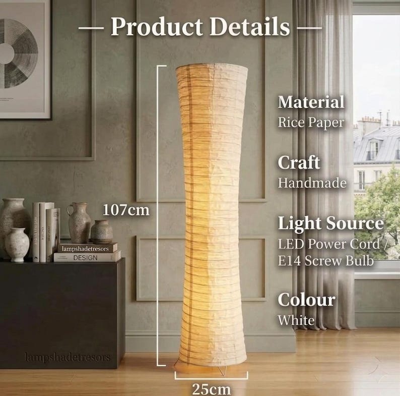May include: A white, handmade rice paper floor lamp, 107cm (42 inches) tall and 25cm (9.8 inches) wide. It features an LED power cord and an E14 screw bulb. The lamp's neutral colour makes it suitable for various interior styles.