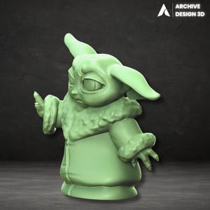 May include: A light green 3D-printed figurine of a character with large ears and a fur-lined coat. The figurine is in a pose with one hand raised and the other at its side. The Archive Design 3D logo is in the upper right corner.