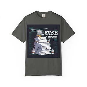 May include: Dark gray t-shirt with a graphic featuring a helicopter delivering pizza to a stack of pizza boxes. Text reads "STACK OVERFLOWING - Send Help (or Pizza)" with "EXCEPTION" on a box.