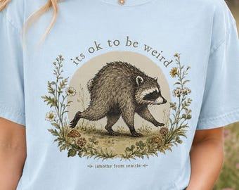 Jimothy from Seattle It’s OK to Be Weird Raccoon Cottagecore T-Shirt