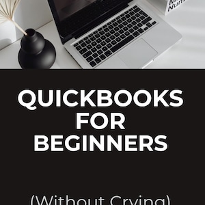 May include: A laptop computer with a black screen sits on a white surface next to a black vase with a dried plant. A book with the text "Mocafico Numero" is visible. The image also contains the text "Quickbooks for Beginners (Without Crying)".