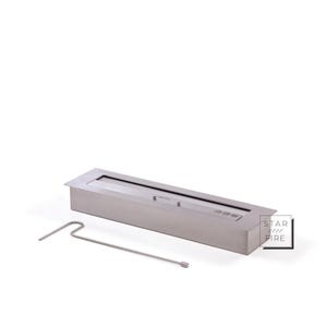 May include: A rectangular, stainless steel fireplace insert with a long, narrow opening. A metal tool rests beside the insert. The Star Fire logo is visible on the right side. This product is designed for indoor use.