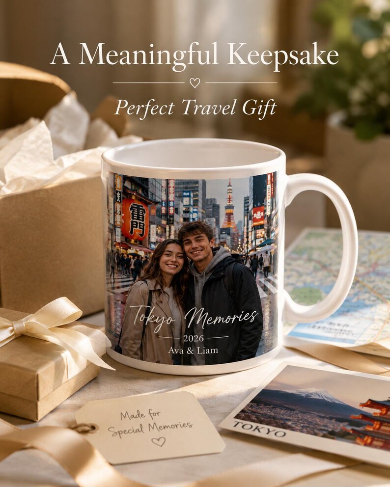 May include: White ceramic mug featuring a photo of a couple in Tokyo, Japan, with the text "Tokyo Memories" and the names "Ava & Liam." The mug is surrounded by gift boxes, a tag that says "Made for Special Memories," and a postcard.