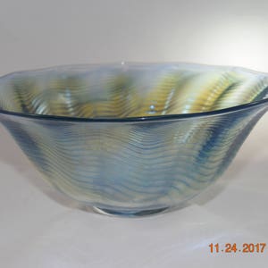 Handblown light silver-blue glass bowl with distinctive texture