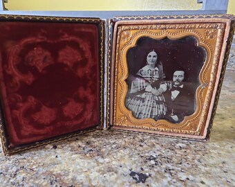 Ruby glass ambrotype, sixth plate, c. late 1850s–early 1860s