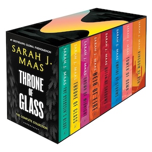 May include: A boxed set of fantasy novels by Sarah J. Maas, titled "Throne of Glass: The Complete Collection." The set includes eight books with colorful spines, and the box features the series title and author's name in bold white and yellow text.