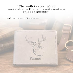 May include: A light gray bi-fold wallet featuring an engraved deer head illustration and the name Parmer. Above the wallet, text reads: The wallet exceeded my expectations. It&rsquo;s very pretty and was shipped quickly. - Customer Review.