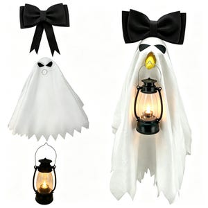 May include: A white ghost decoration featuring a black bow on top, black eye markings, and a yellow beak. The ghost holds a black lantern with a glowing light. A separate black bow and a separate black lantern with a glowing light are also shown.
