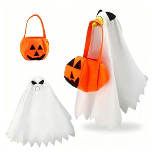 May include: A white ghost figure with black eyes and a circular mouth, and an orange fabric pumpkin bucket with a black jack-o'-lantern face. One ghost figure is shown holding the orange pumpkin bucket by its handle on its yellow beak.