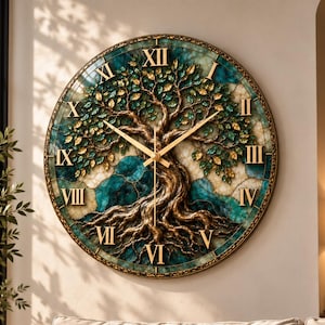 May include: A round wall clock featuring a relief sculpture of a tree with gold-toned roots and branches against a teal and white mosaic background. The clock face displays gold Roman numerals and thin gold hands, encased in a dark metal frame.