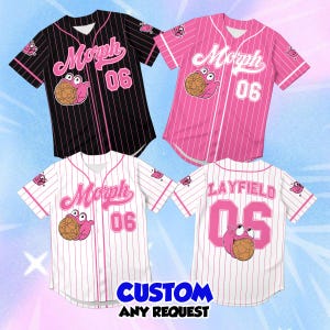 May include: Four baseball jerseys in black, pink, and white with pinstripes. Each features the text Morph, the number 06, and a pink creature graphic. One white jersey displays the name LAYFIELD on the back above the number 06. Custom text is visible.
