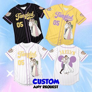 May include: Four baseball jerseys featuring a Tangled theme. Three jerseys display the text Tangled and 05 with a couple illustration. One jersey shows the name Jaelyn above a purple Mickey Mouse silhouette and a couple dancing. Colors include black, yellow, and white.