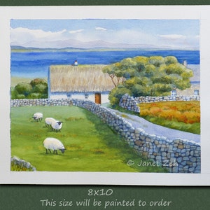 May include: Watercolor painting of a rural landscape featuring a white cottage with a thatched roof, stone walls, and grazing sheep. A road leads to the cottage, with a blue sea and sky in the background. The painting is 8x10 inches.