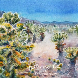 May include: Watercolor painting of a desert landscape with a cluster of cholla cactus in the foreground. The cactus are green with yellow flowers and are set against a background of blue sky and distant mountains. The painting is signed "Sample" and labeled "5x7 watercolor".