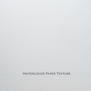 May include: Close-up of a white textured watercolor paper surface. The text "WATERCOLOR PAPER TEXTURE" is printed in black at the bottom of the image.