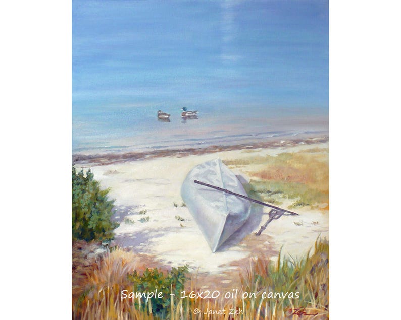 May include: A painting of a white boat on a sandy beach with a blue sky and water in the background. The boat is upside down and has a long oar sticking out of it. There are two small boats in the distance. The painting is titled "Sample 16x20 oil on canvas" and signed "Janet Zehl".