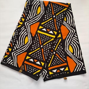 Black African Wax Print Fabric – Bold Abstract Tribal Pattern | Orange, Yellow & White Ankara Fabric | Modern Statement Textile for Fashion