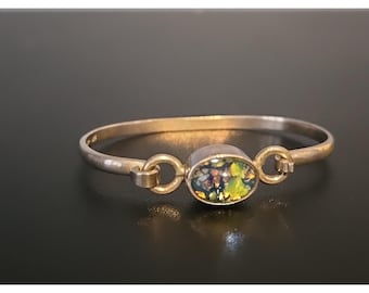 Pulsera tipo brazalete vintage mexicana de plata de ley 925 con una rara piedra azul.