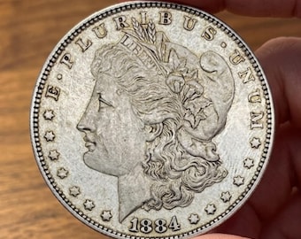 Moneda estadounidense de un dólar Morgan de 1884