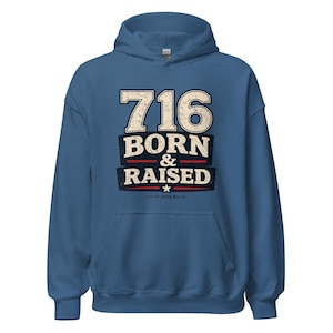 May include: A blue hooded sweatshirt featuring a distressed graphic print that reads 716 BORN & RAISED in white and dark blue lettering, accented with red horizontal lines and a small white star, with the copyright text 2026 RJ printed below.