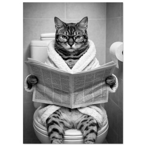 May include: Black and white image of a cat wearing glasses and a bathrobe, sitting on a toilet and reading a newspaper. The cat has tabby markings and is the central focus of the image. A roll of toilet paper is visible in the background.