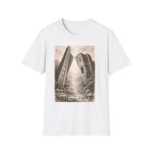 May include: White t-shirt featuring a detailed black and white illustration of an ancient city with towering structures and a central pathway. The artwork evokes a sense of history and architectural grandeur, suitable for those interested in art and history.