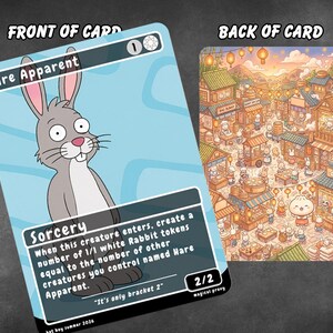 May include: A game card titled Hare Apparent featuring a grey cartoon rabbit on the front with the text Sorcery and game rules. The back of the card displays a detailed illustration of a bustling market scene filled with small white rabbits.