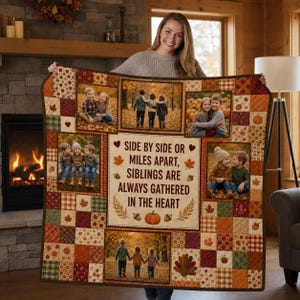 May include: A patchwork quilt featuring multiple rectangular photo frames of children in autumn settings, interspersed with squares of fall-themed patterns. The center panel displays the text: Side by side or miles apart, siblings are always gathered in the heart.