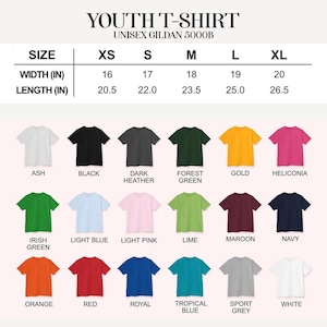 May include: A chart displaying a variety of youth t-shirt colors and sizes. The shirts are available in sizes XS to XL, with width measurements from 16 to 20 inches and lengths from 20.5 to 26.5 inches. Colors include Ash, Black, Dark Heather, Forest Green, Gold, and more.