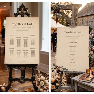 Puede incluir: Dos planos de asientos de boda en caballetes decorativos. Los letreros dicen "Together at Last" con los nombres Emma & James y la fecha 14 de octubre de 2026. Cada letrero enumera los nombres de los invitados debajo de los números de mesa.