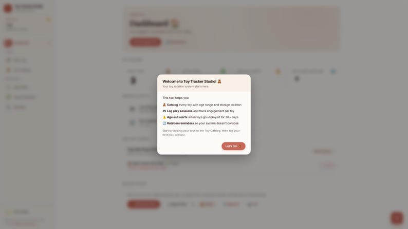 May include: A digital interface for Toy Tracker Studio featuring a welcome pop-up window. The text reads: Welcome to Toy Tracker Studio! This tool helps you: Catalog every toy, Log play sessions, Age-out alerts, and Rotation reminders. A button says Let's Go!
