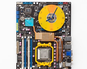 Wall clock made of dark brown motherboard with unique yellow details, ready to ship