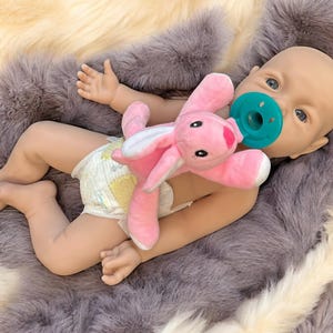 17 inch 6.1 lbs Platinum Full Silicone Doll With  Open Mouth To take a Pacifier Has a Squishy Body