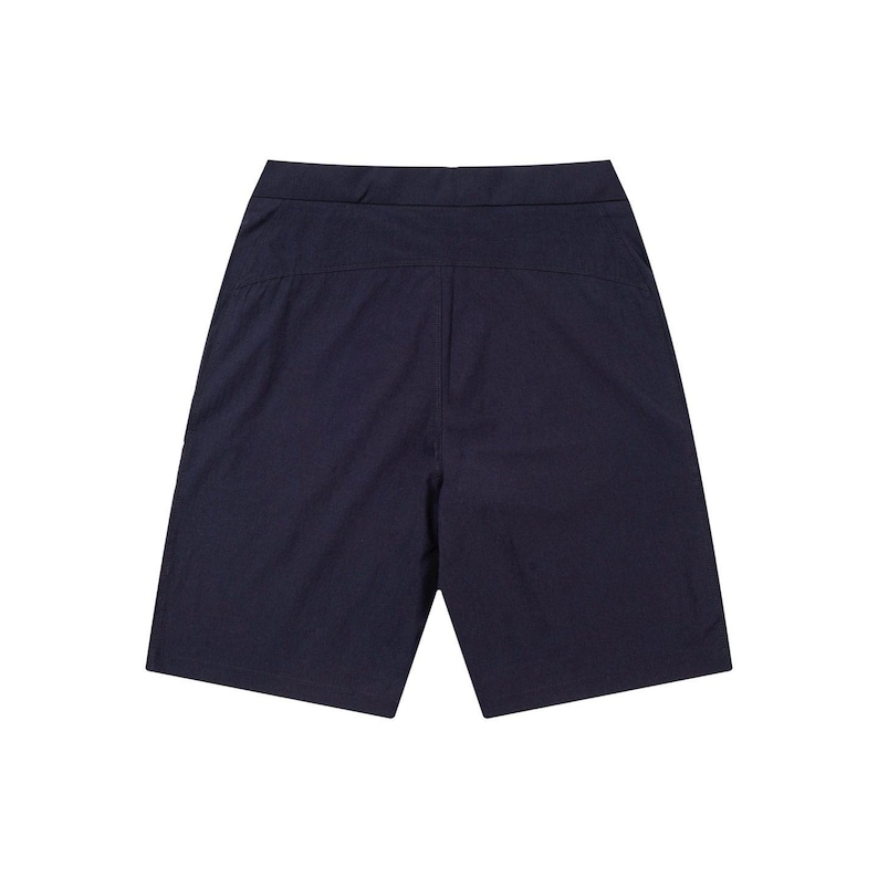 May include: Navy blue shorts with a tailored design. The shorts have a flat front and a clean, minimalist aesthetic. The fabric appears to be a lightweight, woven material, suitable for warm weather. The shorts are designed for comfort and style.