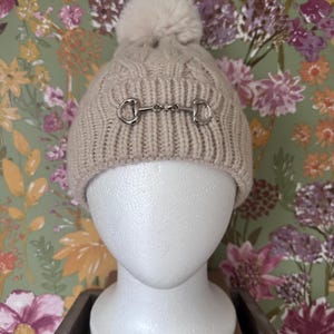 Beige Cable Knit Bobble Hat with Silver Plated Snaffle Bit