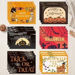 May include: A collection of six sets of rectangular Halloween greeting cards featuring various designs including pumpkins, black cats, bats, spiders, webs, and tombstones with text such as Happy Halloween and Trick or Treat in orange, black, and red.