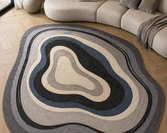 irregular rug, abstract rug, modern rug, handmade rug, wool rug, organic rug, contour rug, neutral rug, luxury rug, living room rug, unique rug