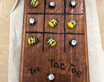 Handcrafted magnetic Tic Tac Toe game.